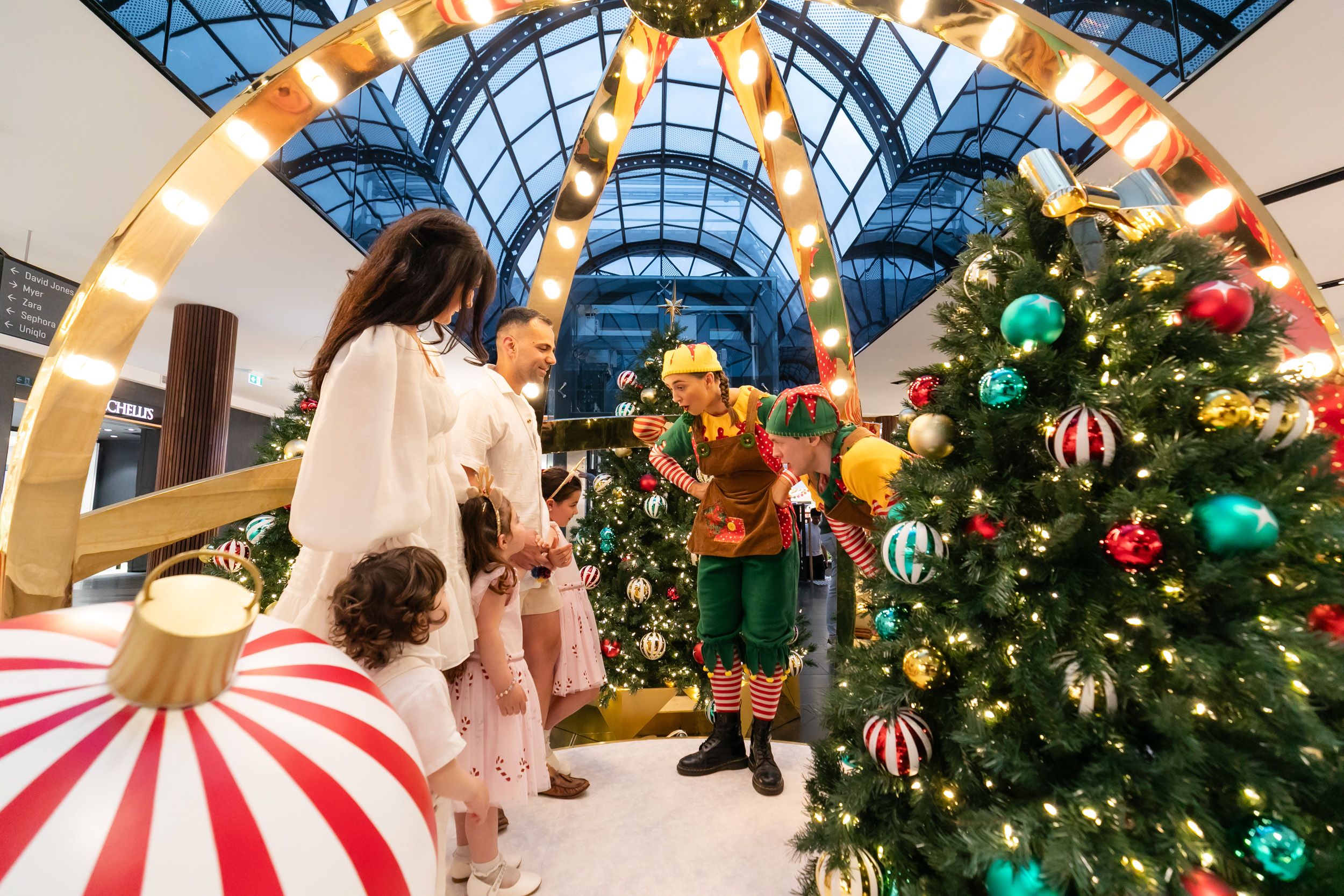 Family visiting Santa