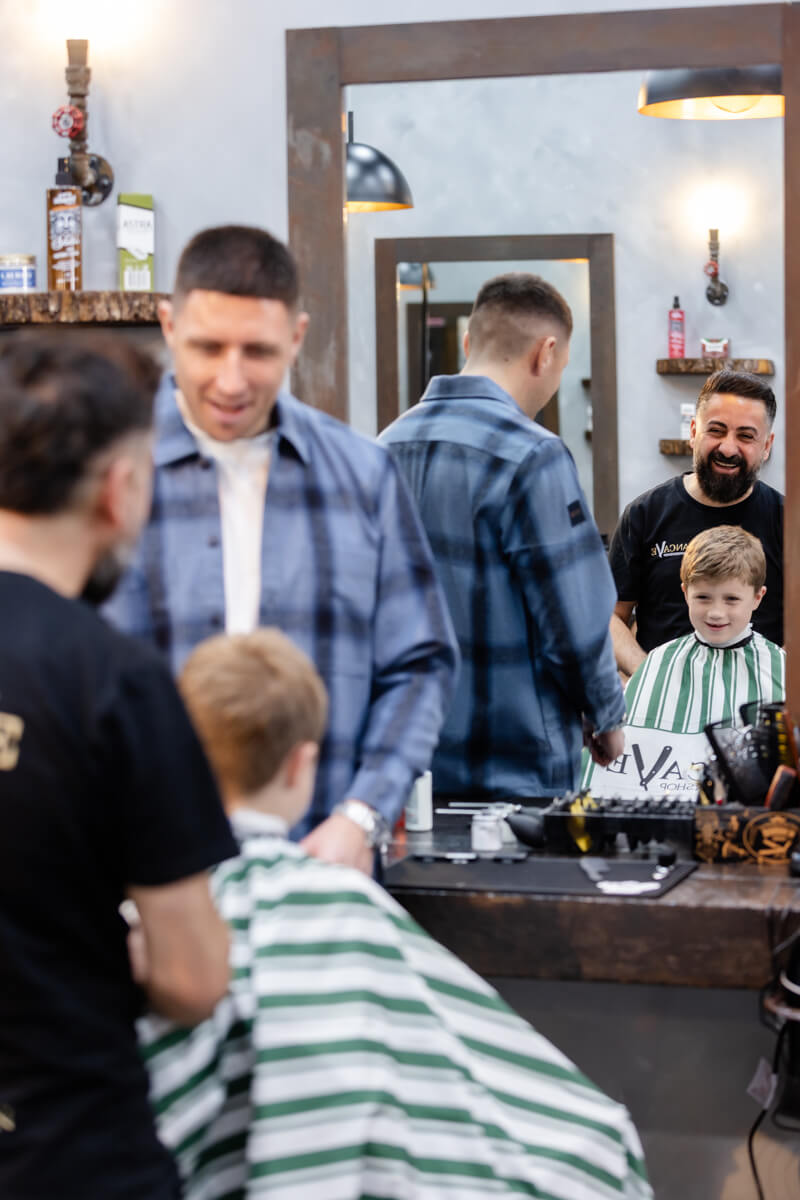 025-MC Lifestyle Brand - Positioning Campaign-25Jun26 Boy at barber with dad